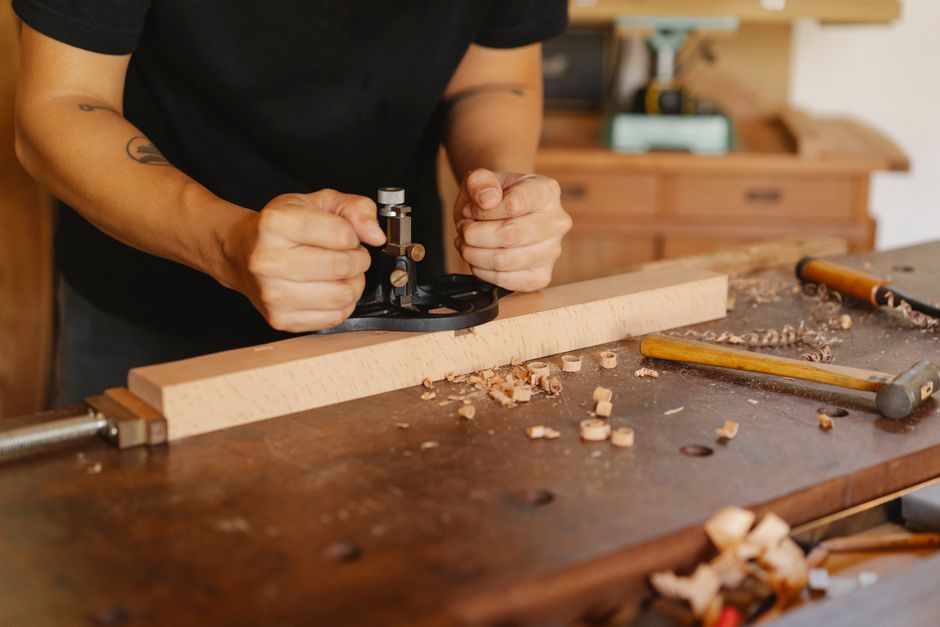Artisans at work in the furniture maker workshop